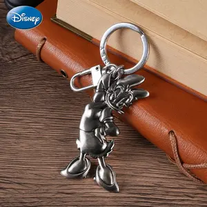 1PC Disney Officially Licensed Daisy Duck Keychain Cartoon Cute Metal Key Ring Pendant Couple Style Fashion Trend Backpack Car Keys Accessories Exquisite Creative Desk Decorations Christmas Memorial Day Valentine Day Surprise Gift
