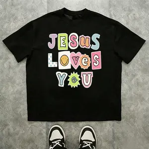Men’s “Jesus Loves You” graphic T-shirt features colorful bubble letters with smiley accents. Made of soft cotton, it's perfect for church, gatherings, or casual days to showcase your faith in style.