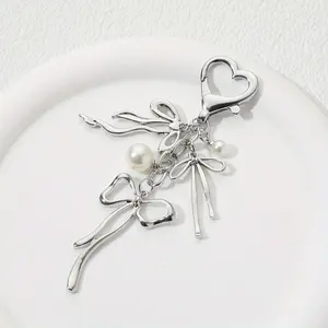 1pc Exquisite bow keychain, high-end bag pendant, butterfly multifunctional small pendant, bag keychain. Charms