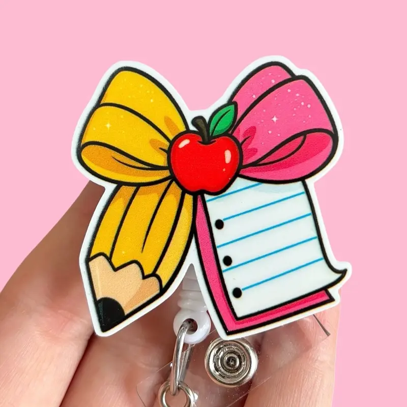 Glitter My Badge teacher pencil bow badge reel for nurse and hospital workers. Badge clip Badge pull - Retractable swivel clip with a 360 rotation. Great gift for coworker.