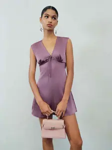 Cider Satin V-neck Ruched Knotted Tie Back Mini Dress