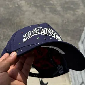 Dandy Hats Diecimo Aniversario Navy Blue Cap with White Lettering and Sparkling Details