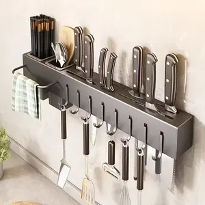A Multifunctional Carbon Steel Wall-Mounted Organizer for The Kitchen, Designed for Easy Installation Without Drilling. It Serves As a Storage Rack for Commercial Utensils, Plastic Chopsticks