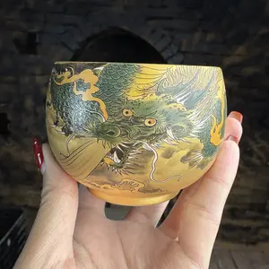 Handmade tea cup with golden dragon