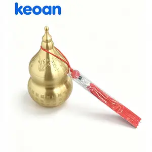 A golden gourd with red tassels in a Chinese style, suitable as a decorative piece for cars, desks, coffee tables, or rooms. The surface of the gourd is engraved with words and the Four Gentlemen, symbolizing both blessings and prosperity.
