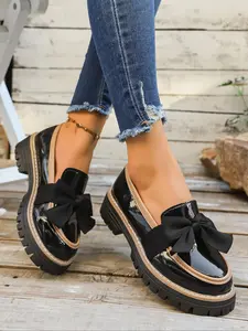Women's Black Patent Leather Platform Loafers with Brown Bow, Preppy Retro-Chic Style, Lug Sole, Perfect for Daily & School Outfits PreppyRetroShoes, BlackPlatformLoafers, CampusChicShoes, Flatform