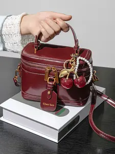 Vintage light luxury exquisite atmosphere handbag, with pearl pendant and cherry pendant decorations, simple decorations, fashionable and personalized one shoulder crossbody bag, suitable for dates, parties, shopping, Casual Shoulder Bag