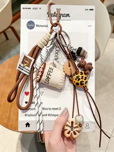 Croissant Bag Charm Realistic Bread + Leopard-Print Heart Design Two-Tone Braided Rope Maillard Color Palette Korean Retro Style Niche And Refined Stylish And Versatile Complex Design For Bags, Keys, And Earphone Cases