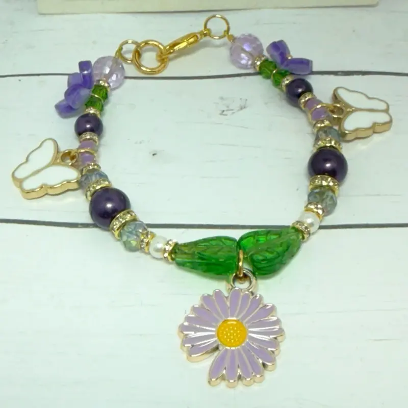 Handmade purple daisy flower & butterfly charm bead bracelet