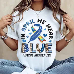 In April We Wear Blue Autism Awareness Ribbon And Puzzle Piece Print T Shirt Casual Round Neck Short Sleeve For Women Autism Awareness Month