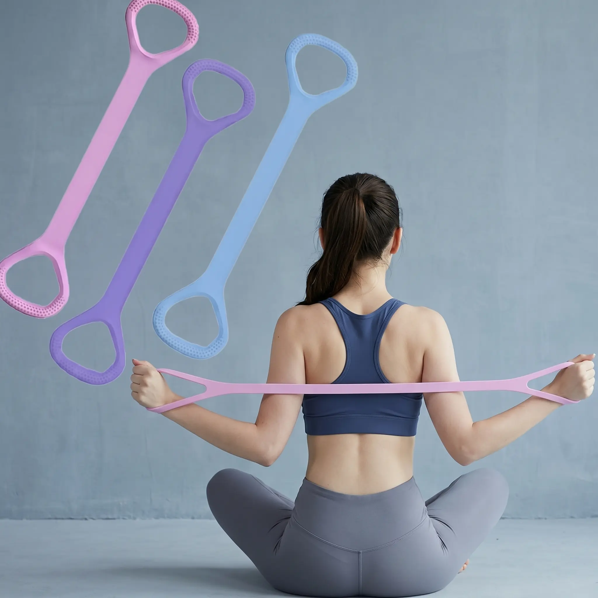 Figure-8 style elastic resistance band with handles, 25 lb training band suitable for men and women, designed for general body conditioning and everyday use at home, office, or while traveling