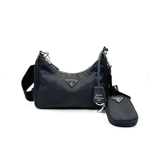 Pre-owned PRADA AS SHOWN Clutches & Wristlets HZ 1059 Re Edition 2005 Re Nylon shoulder bag in black 26.01.21