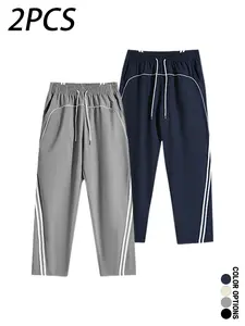 Multi-pack men’s casual long pants for spring and autumn, featuring a deconstructed color-block striped patchwork design, drawstring elastic waistband, loose fit—versatile for everyday wear, leisure, sports, and fitness.