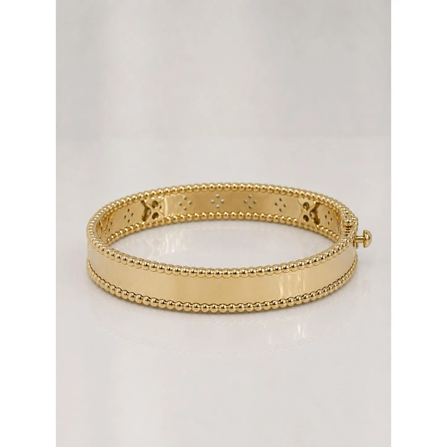 Elegant Gold Bangle Bracelet with Beaded Edge and Floral Design for Women's Fashion Accessory