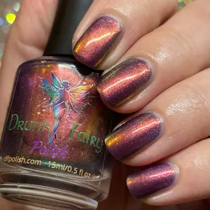 Tainted Love Nail Polish by Drunk Fairy Polish | A Darkened Violet Jelly Base with an Aurora Shimmer from Orange to Red to Gold to Green