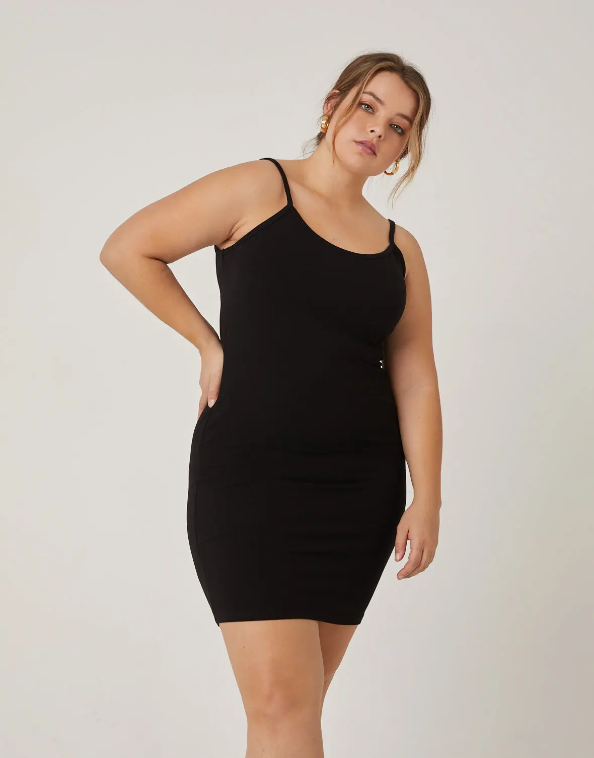 bodycon dress for plus size women L I V D Plus Size Raven Faux Wrap Bodycon Dress