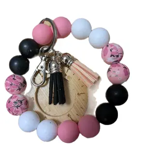 Round Keychain with colored Beads and Design Accessory. Bird & Beads design