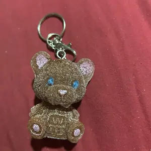 Resin Teddybear Keychain with Glittery Brown Finish and Blue Eyes for Unique Accessory