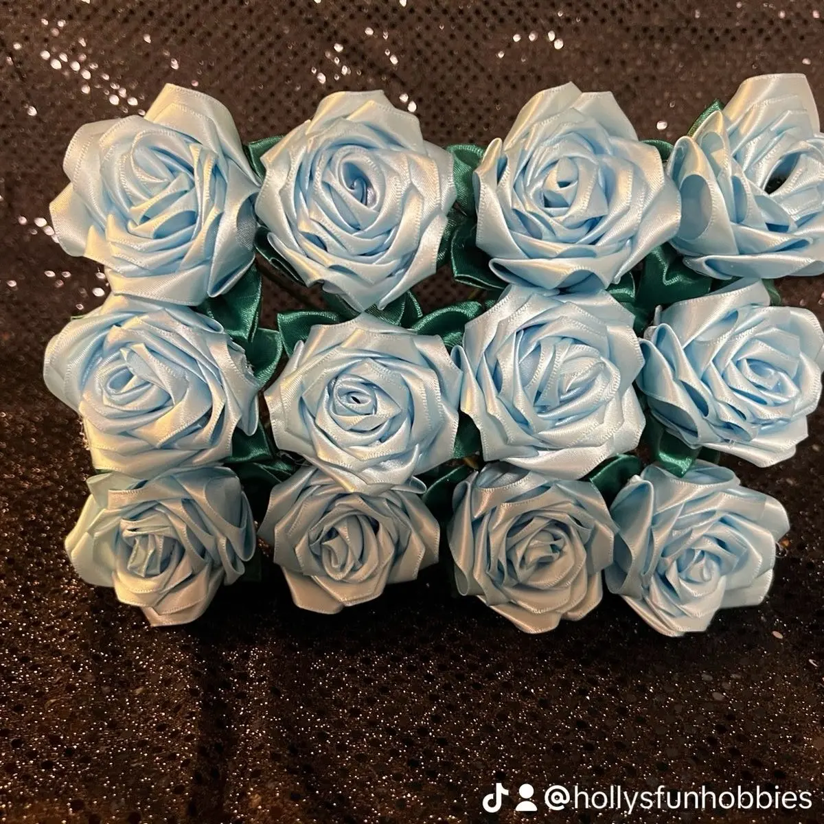 Light blue handmade satin roses