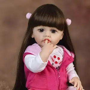 22 inch long hair reborn doll, plush toys for young people, cute girl with long hair, beautiful clothes / perfect gift for young people on birthdays, holidays or Christmas. , gift doll for young people Stuffed Animal
