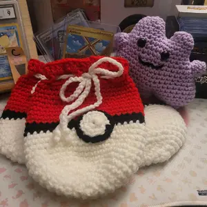 Handmade pokeball crochet bags