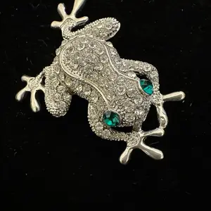 Rhinestone frog brooch