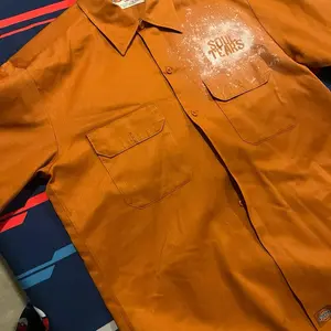 BURNT ORANGE SOUL TEARS UNIFORM LINE SIZE LARGE WORK TEE COLLARED SHIRT MECHANIC STYLE SPRAYED MEDIA WITH POCKETS UNISEX