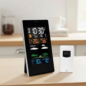 Wireless weather station with indoor and outdoor temperature and humidity monitors; digital thermometer with color LCD screen.