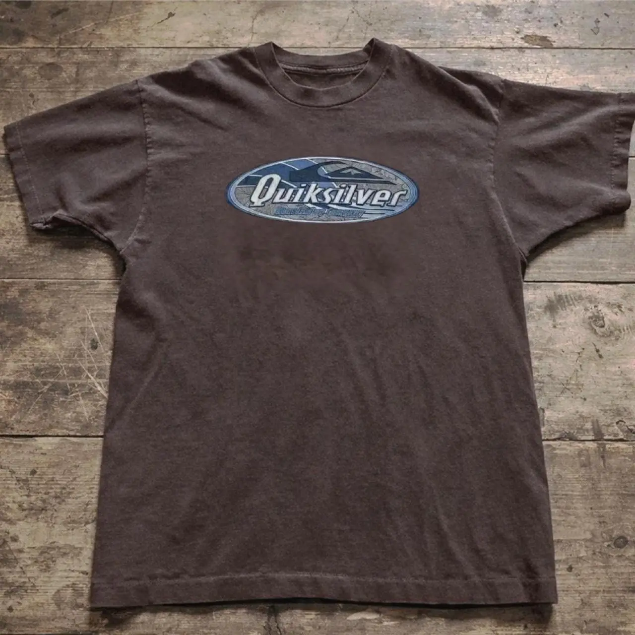 Quiksilver surf tee with blue oval logo
