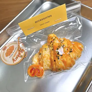 Paw & Paw Super Cute Croissant Taba Squishy Fidget Toys, Super Soft and Squeezable, Cute Dessert, Stress Reliever, Handmade Squishies