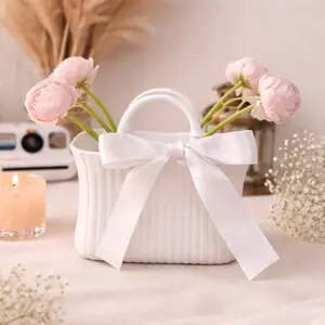 This mini vase looks like a bag  3D printed decor idea
