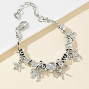 Viral Silver Charm Bracelet for Women, DIY Style Snake Chain Bracelet with Star, Bow, Music Note & Heart Charms, Sparkly Crystal-Encrusted Statement Jewelry, Trendy Stackable Layering Accessory, Adjustable Fit, Waterproof & Tarnish Resistant