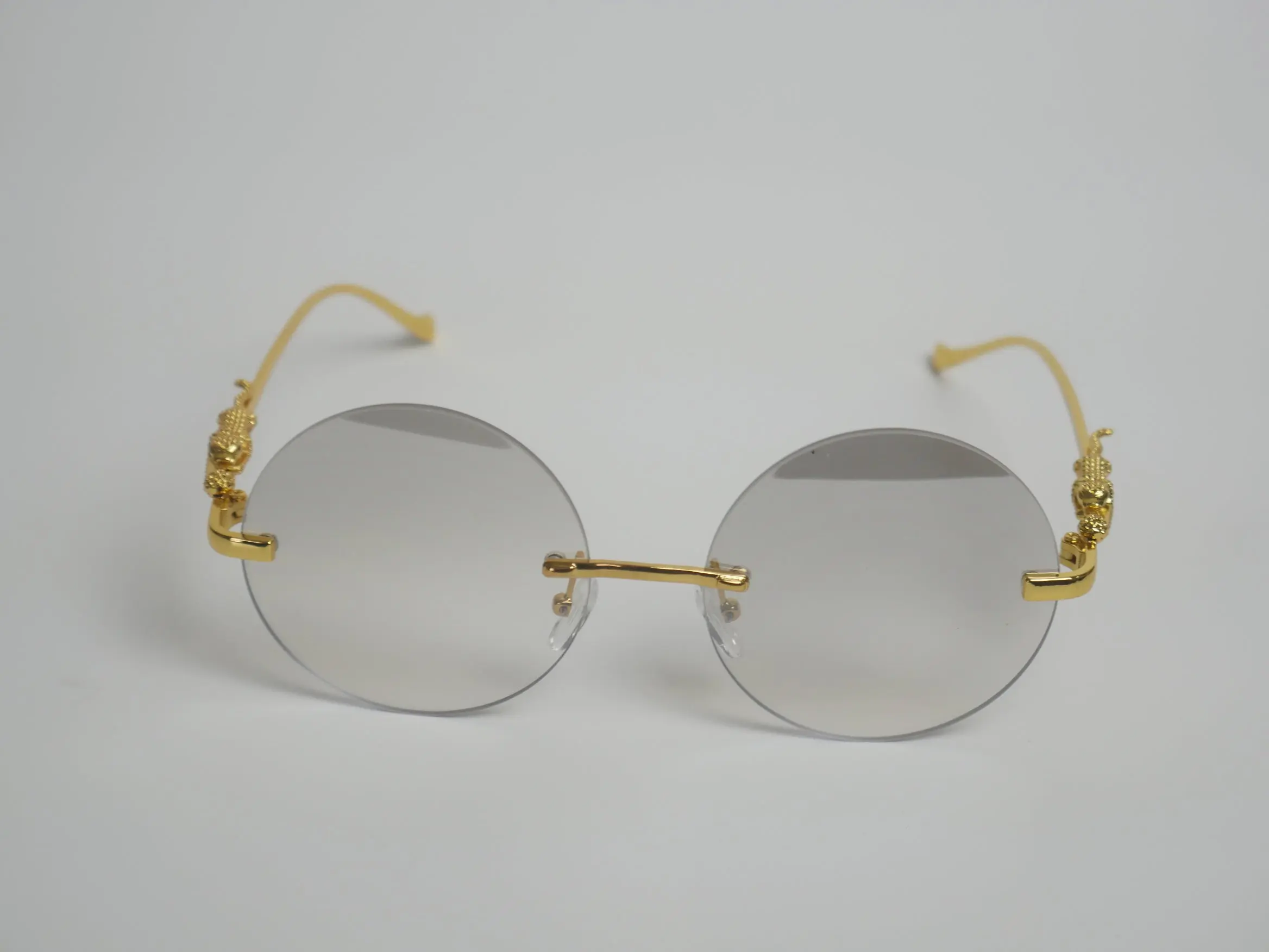 Charm Retro Round Rimless Sunglasses with Skull & Dragon Detail