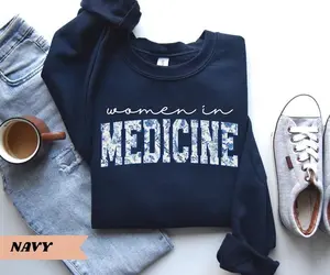 [Sale Up To 40%] Women In Medicine Sweatshirt Gifts For Female MD Sweatshirt New Doctor Physician Shirt Nurse Grad Medical Doctor Sweatshirt Med School Grad