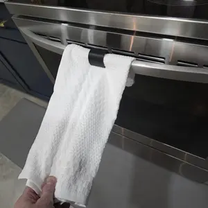 No-Slip Towel Holder for Stove Handle Kitchen Dish Towel Clip Keeps Towels Secure Fits Most Oven Handles Sleek Minimalist Design Easy Install Must-Have Gadget for Every Kitchen Accessory Gift Black Stylish Utensils