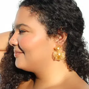 Multilayered crochet earrings with shiny pearls. Post and clip crochet gold earrings