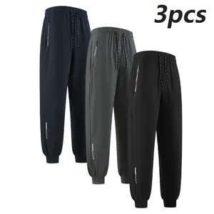 Men's lightweight ice silk joggers with zipper pockets & drawstring waistband - breathable, quick-dry casual pants suitable for sports, workouts, & everyday wear; made from 95% polyester, 5% spandex fabric, versatile full-length pants | Drawstring Joggers