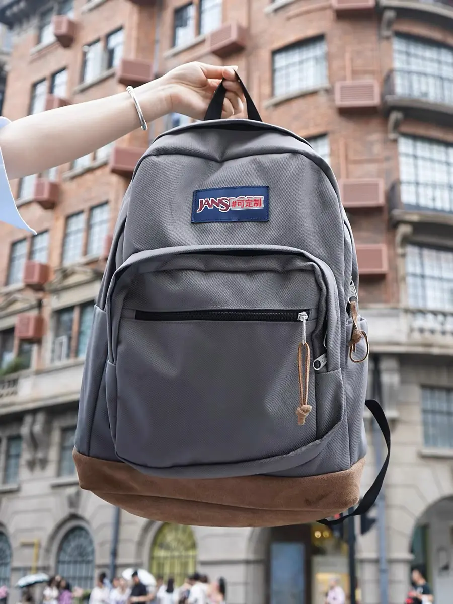 Jansport Big Student Unisex Backpack - Vintage Faded Fabric, Classic Suede Bottom, Letter Patch, Adjustable Straps, 15-in Laptop Compartment, Side Water Bottle Pocket, Large Capacity for School Commute