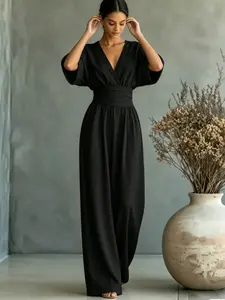 Summer new fashionable and high-end V-neck one-piece wide leg pants with cinched waist for slimming effect. Bubble sleeve design is suitable for daily travel, outdoor lawn banquets, light wedding outfits, afternoon tea, commuting
