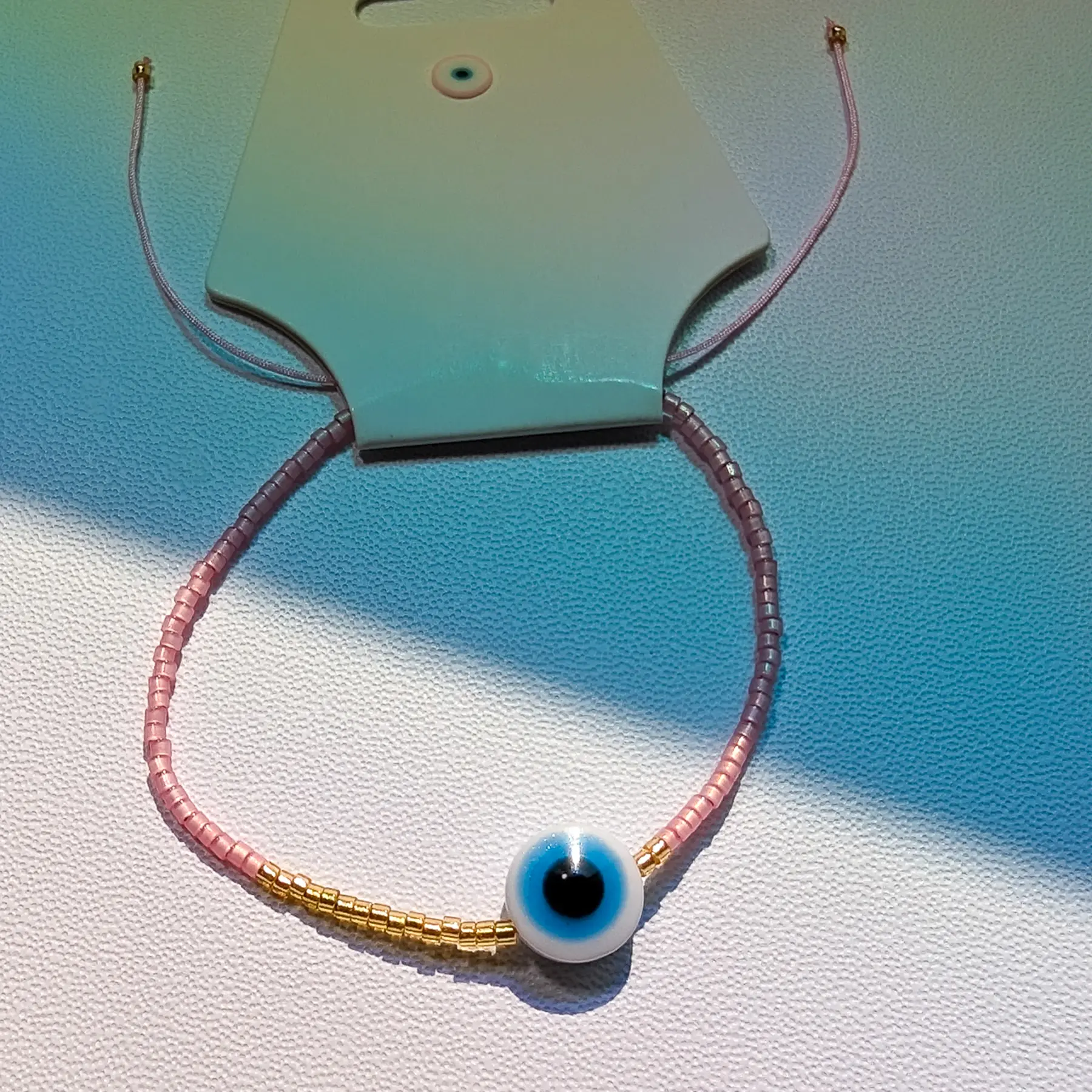 Glassy Pink Prowess Evil Eye Bracelet: beaded, minimalist, boho