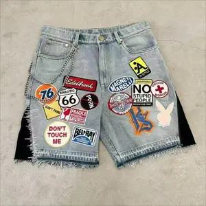 Unisex Y2K Retro Patchwork Denim Jorts, Vintage Graphic Patch Frayed Hem Jean Shorts, Streetwear Loose Fit Hip Hop Shorts, Trendy Summer Casual Street Style Outfit