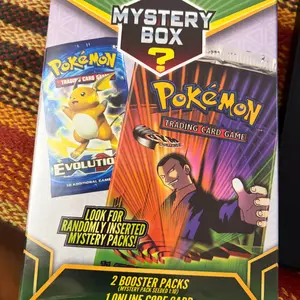 Pokemon 3rd Part Mystery Box-2 Booster Packs and 1 Code card.