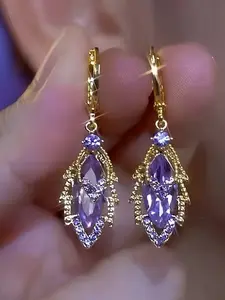 A pair of elegant leaf-shaped rhinestone drop earrings—perfect for weddings and engagements | party and anniversary gifts | everyday jewelry—Valentine's Day gifts | birthday gifts | Mother's Day gifts