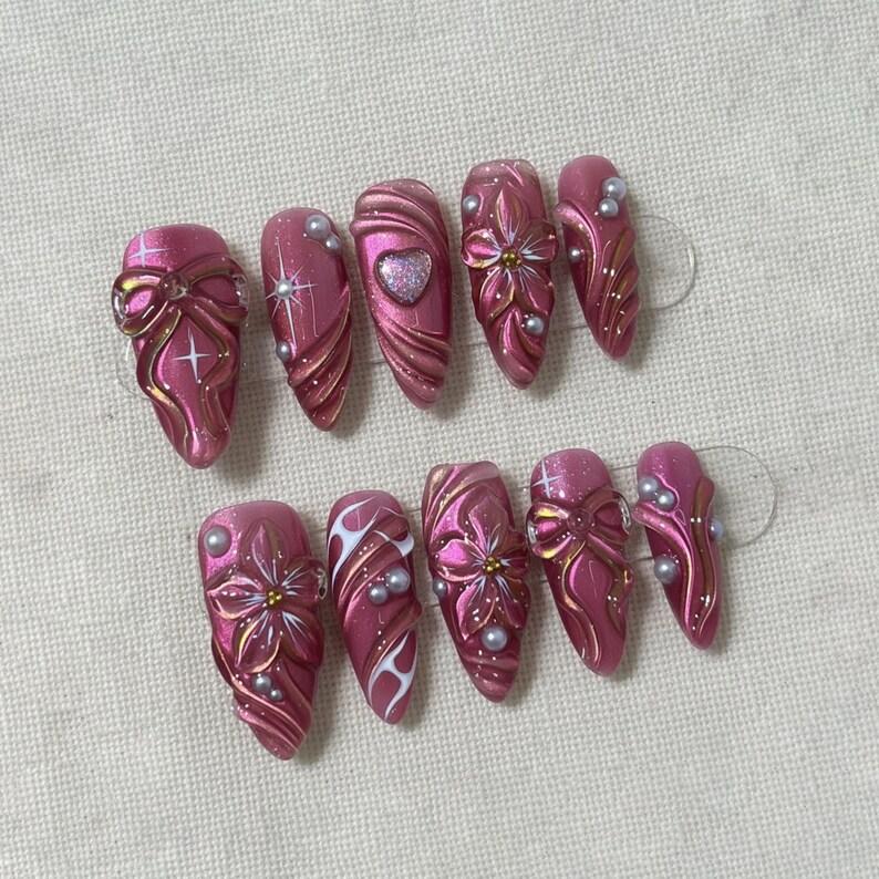 Cute sparkly pink cat eye handmade press on nails with 3D pearl flower and bow art, reusable custom size nail box perfect for sweet gift ideas