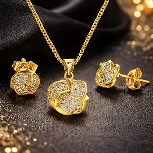 Set Nudo Elegance Oro Laminado – Collar y Aretes