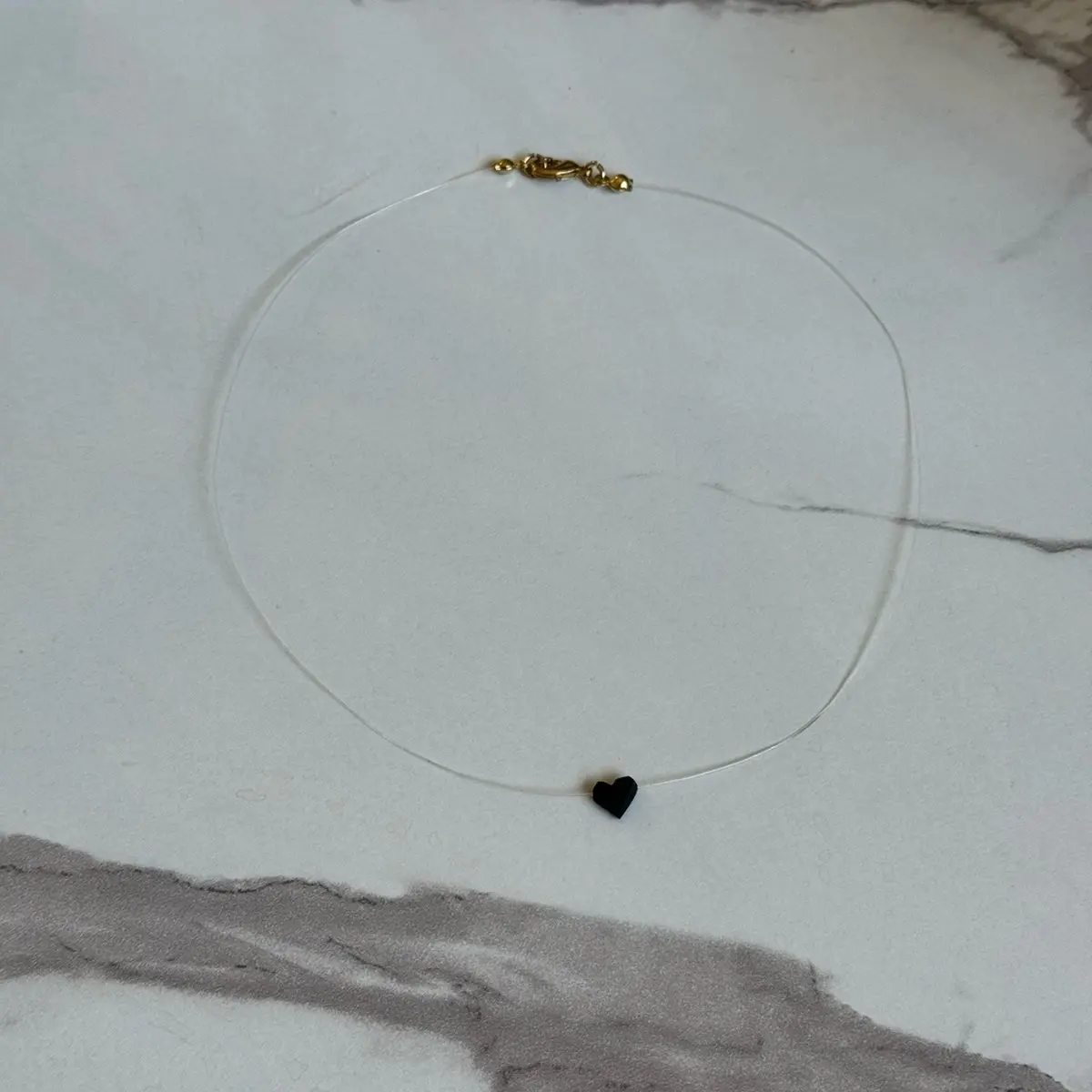 invisible cord with small azabache  heart for woman