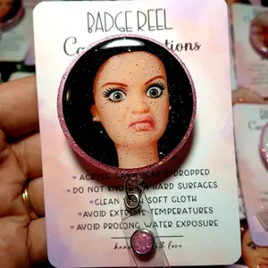 Disgusted Face Doll Badge Reel (BLACK HAIR) Funny Badge Reels Viral Doll Meme Stank Face Doll Cringe Face Doll