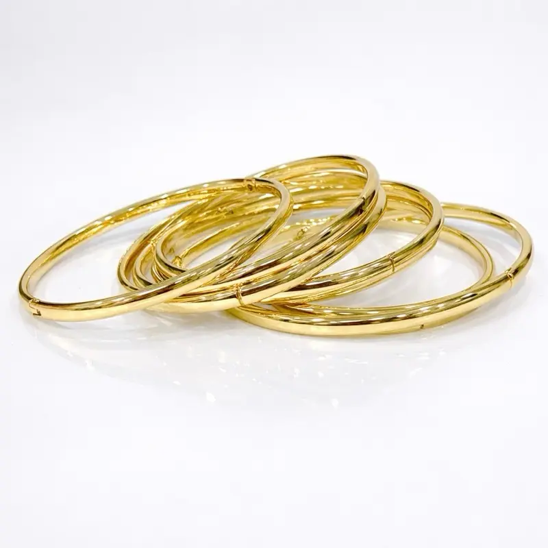 Set de Semanario 7 bangles open size 6,7,7 1/2 gold plated 14 k