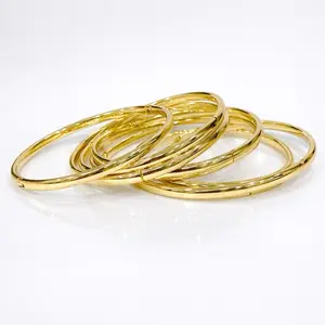 Set de Semanario 7 bangles open size 6,7,7 1/2 gold plated 14 k