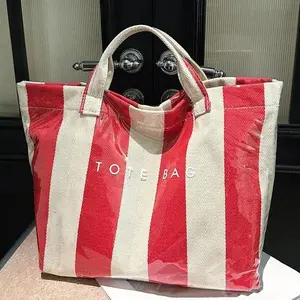 New large capacity striped handbag, simple and fashionable color block handbag, daily commuting shopping bag, retro and fashionable style women's tote bag, fashionable letter design large homeless bag